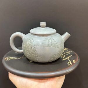 ấm pha trà tử sa nê hưng khắc sơn thuỷ thủ công màu xanh pha trà hương ngon 250ml.