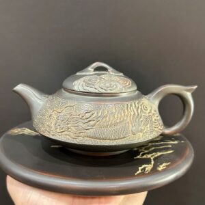 Ấm trà rồng tử sa nê hưng hỏa biến cao cấp pha trà ngon thủ công đẹp công năng tốt.