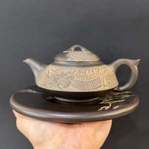 Ấm trà rồng tử sa nê hưng hỏa biến cao cấp pha trà ngon thủ công đẹp công năng tốt.